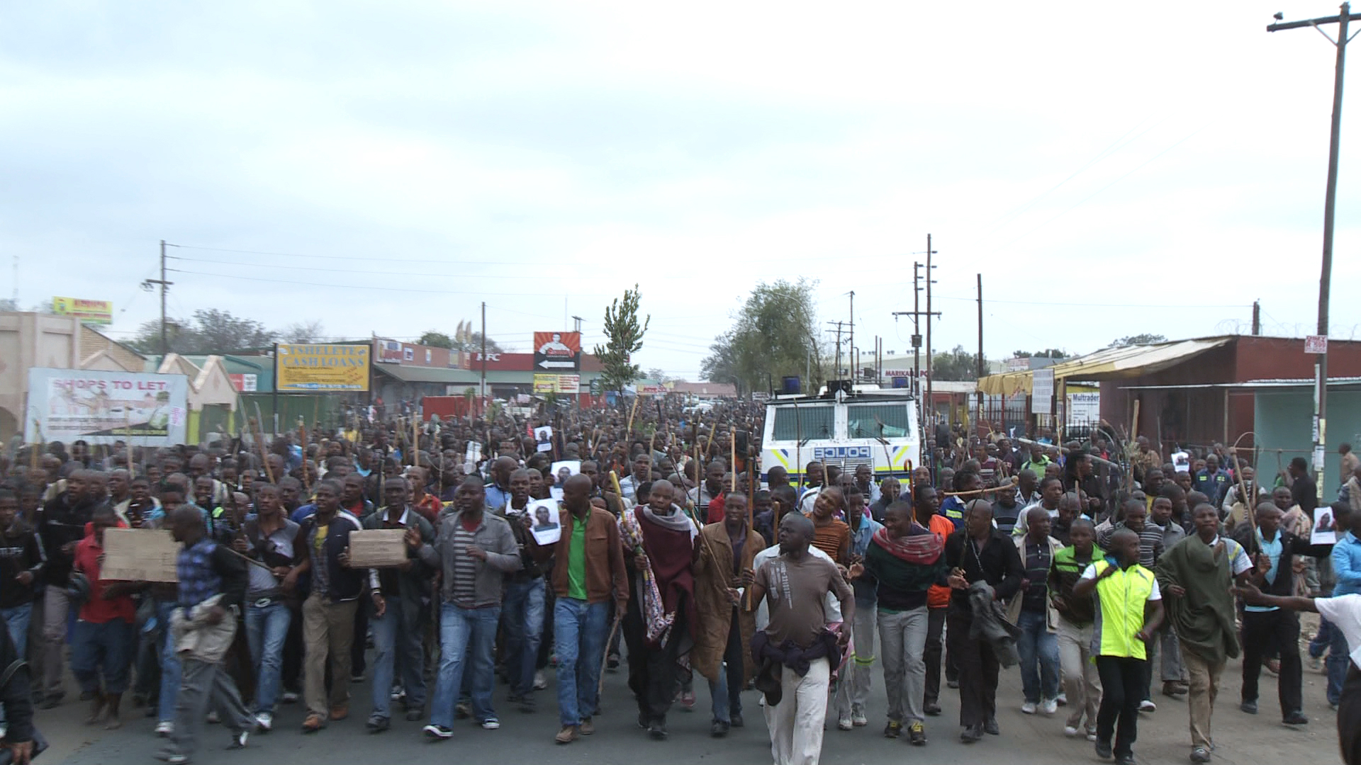 Striking mine workers in Marikana high street